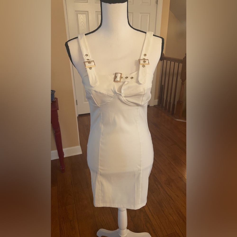 It’s a cute white dress that is perfect for clubbing I bought it online asos